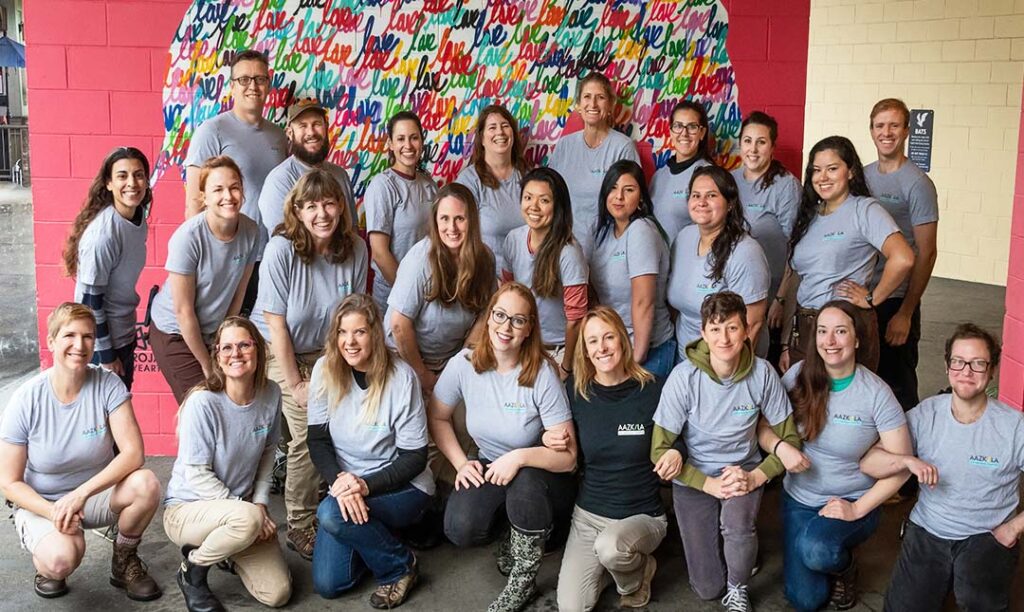 Group photo of zoo keepers wearing AAZK tshirts.